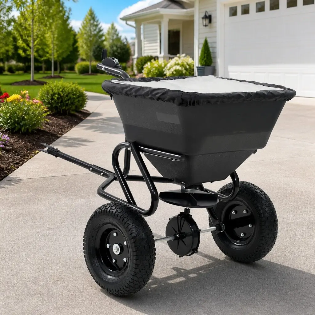 Tow Behind Spreader Black 45L Cable Operated Controller Large Wheels Easy Maneuvering