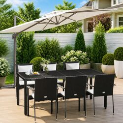 7 Piece Black Poly Rattan Dining Set for Outdoor Enjoyment