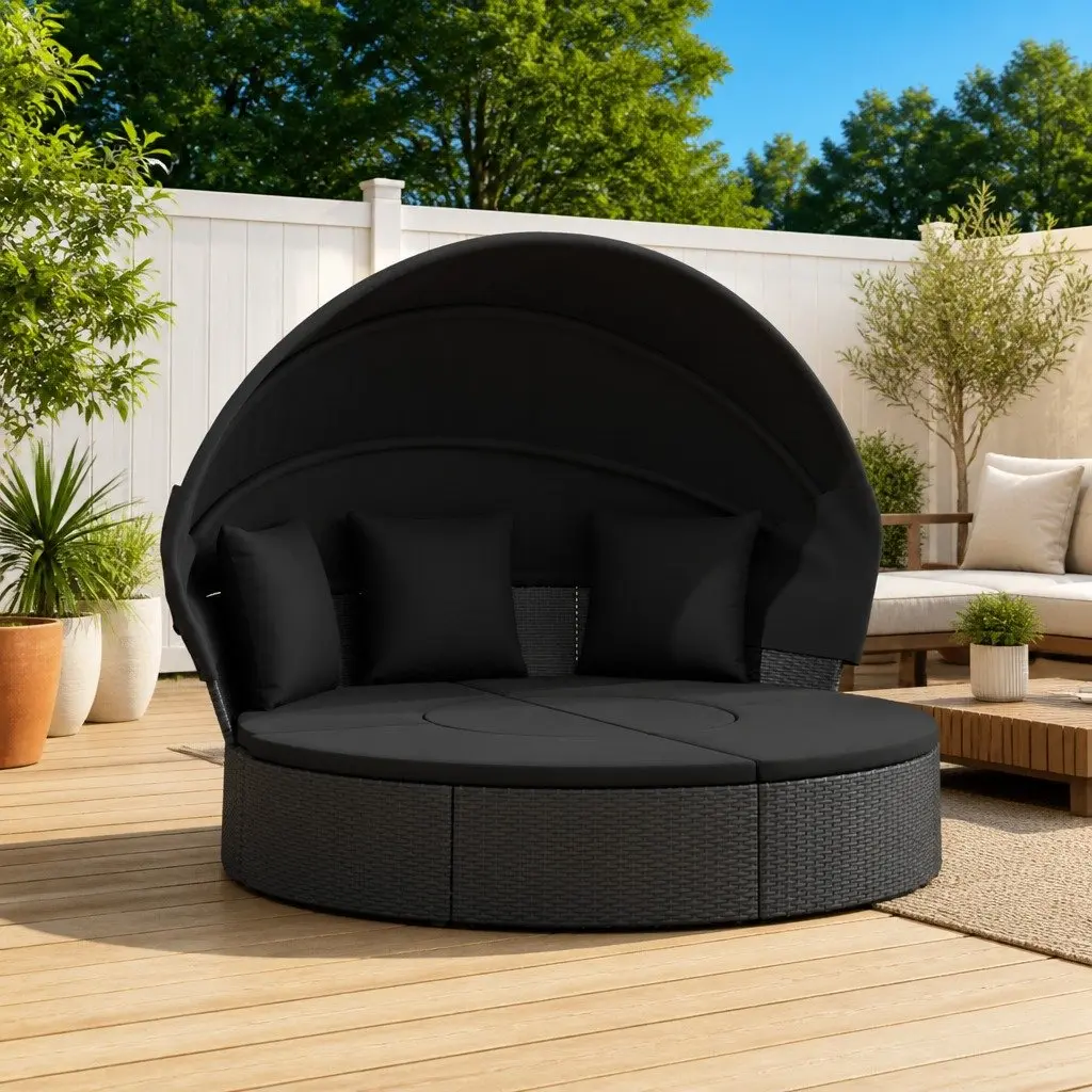 Outdoor Lounge Bed Black with Canopy Cushions PE Rattan for Garden Relaxation